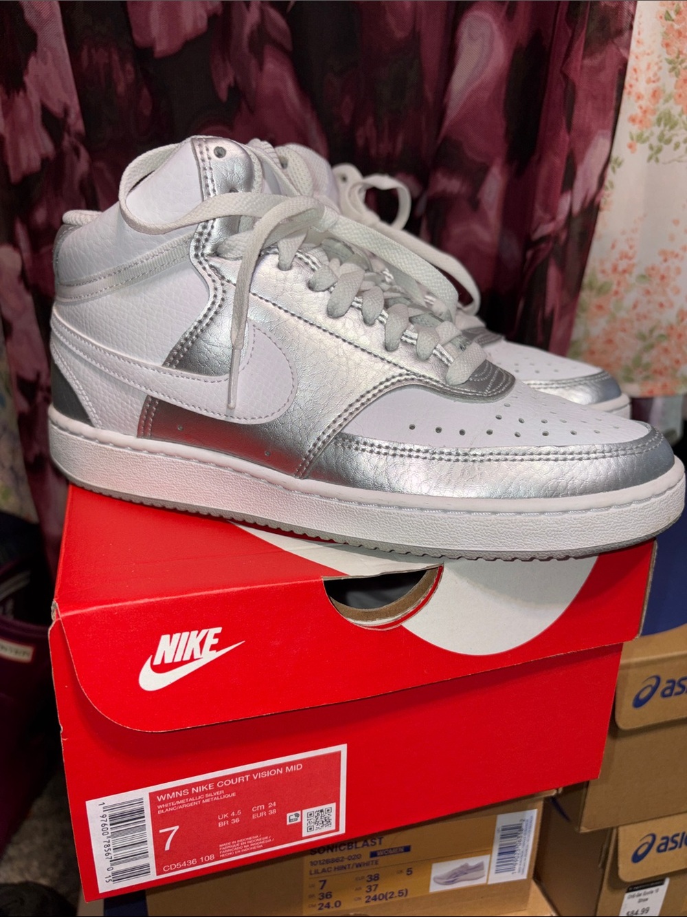 Nike Women’s Mid-Top Sneakers in White and Silver